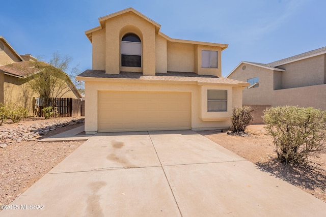 3556 W Avenida Del Mar, Tucson, AZ 85746 - view of front of home with stucco siding, a garage, and concrete driveway