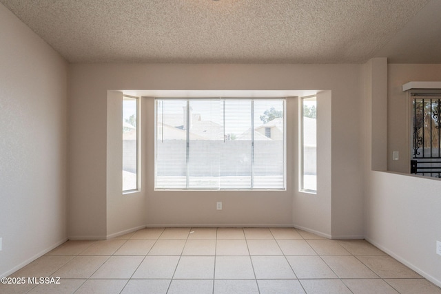 3556 W Avenida Del Mar, Tucson, AZ 85746 - unfurnished room with a textured ceiling and tile patterned floors