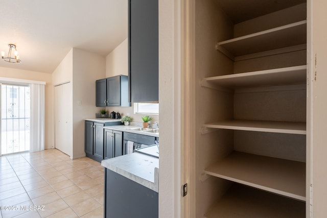 3556 W Avenida Del Mar, Tucson, AZ 85746 - kitchen with open shelves, light countertops, and healthy amount of natural light