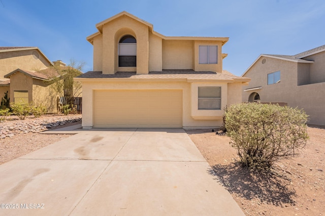 3556 W Avenida Del Mar, Tucson, AZ 85746 - view of front of home featuring stucco siding, a garage, and concrete driveway