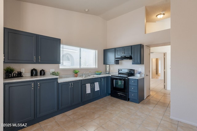 3556 W Avenida Del Mar, Tucson, AZ 85746 - kitchen featuring electric range, under cabinet range hood, high vaulted ceiling, light countertops, and blue cabinets