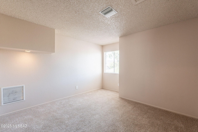 3556 W Avenida Del Mar, Tucson, AZ 85746 - carpeted spare room with a textured ceiling and baseboards