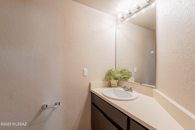 3556 W Avenida Del Mar, Tucson, AZ 85746 - bathroom featuring vanity and a textured wall