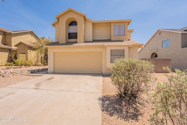3556 W Avenida Del Mar, Tucson, AZ 85746 - view of front of home with a garage, stucco siding, and concrete driveway