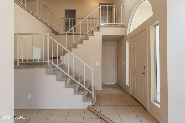 3556 W Avenida Del Mar, Tucson, AZ 85746 - foyer entrance featuring a towering ceiling, stairs, and tile patterned flooring
