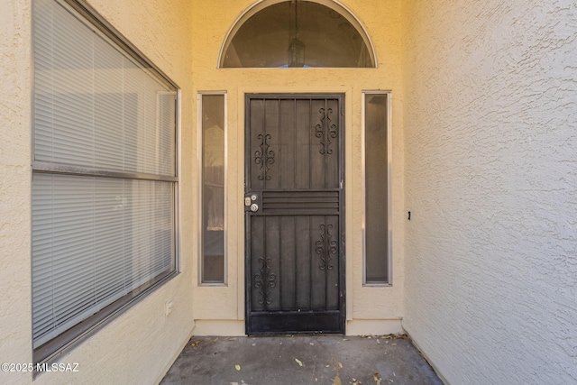 3556 W Avenida Del Mar, Tucson, AZ 85746 - doorway to property featuring stucco siding