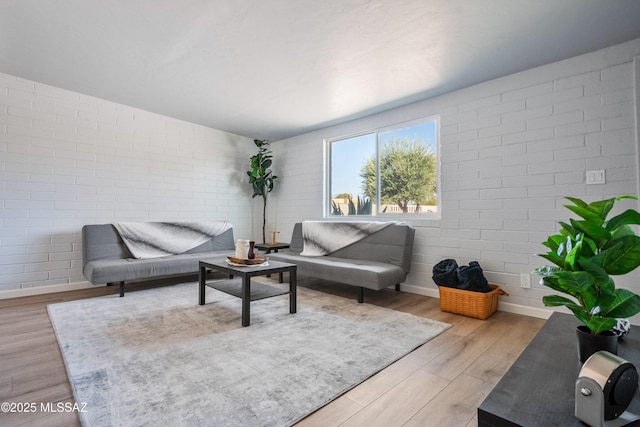 3872 S Evergreen Ave, Tucson, AZ 85730 - living area with light wood-style flooring and baseboards