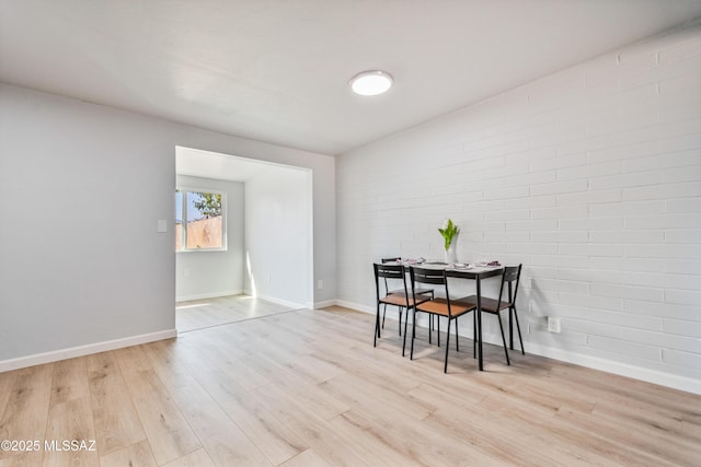 3872 S Evergreen Ave, Tucson, AZ 85730 - dining room featuring light wood-style flooring and baseboards