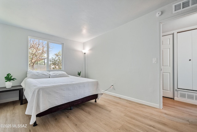 3872 S Evergreen Ave, Tucson, AZ 85730 - bedroom with light wood-style flooring