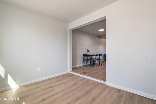 3872 S Evergreen Ave, Tucson, AZ 85730 - empty room featuring baseboards and wood finished floors