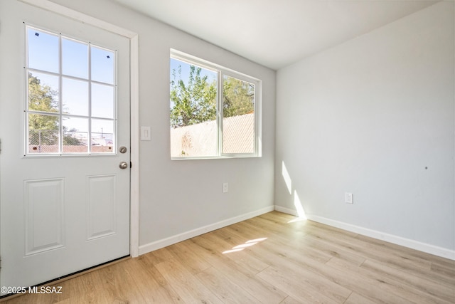 3872 S Evergreen Ave, Tucson, AZ 85730 - entryway featuring light wood finished floors and baseboards
