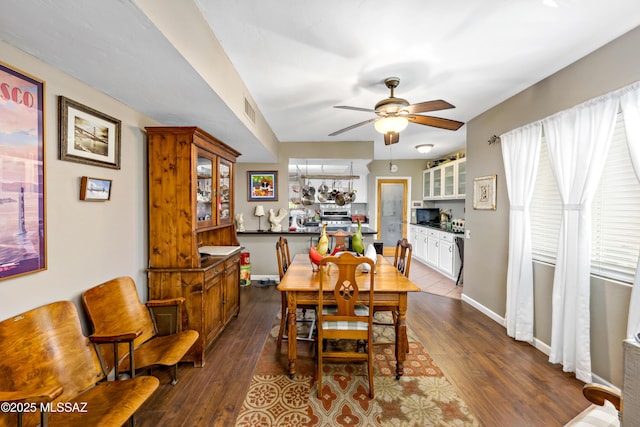 1939 S San Vincent Dr, Green Valley, AZ 85614 - dining area featuring a ceiling fan and dark wood finished floors