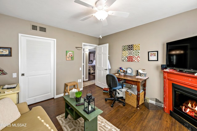 1939 S San Vincent Dr, Green Valley, AZ 85614 - office space with ceiling fan, wood finished floors, and a glass covered fireplace