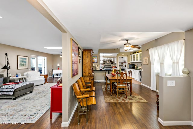 1939 S San Vincent Dr, Green Valley, AZ 85614 - living room with dark wood finished floors and a ceiling fan