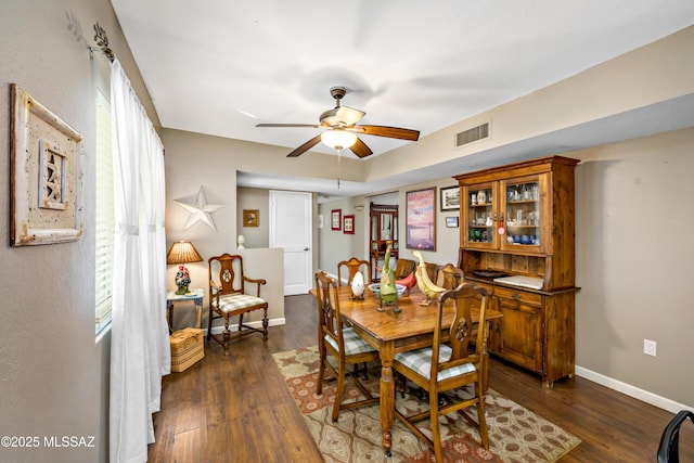 1939 S San Vincent Dr, Green Valley, AZ 85614 - dining room with dark wood finished floors and ceiling fan