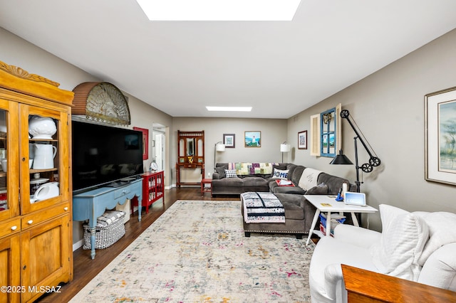 1939 S San Vincent Dr, Green Valley, AZ 85614 - living room with a skylight and dark wood-style flooring