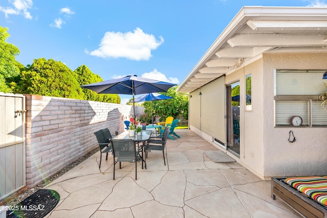 1939 S San Vincent Dr, Green Valley, AZ 85614 - view of patio with outdoor dining area