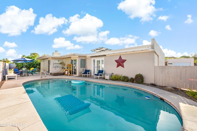 1939 S San Vincent Dr, Green Valley, AZ 85614 - view of swimming pool with a patio area