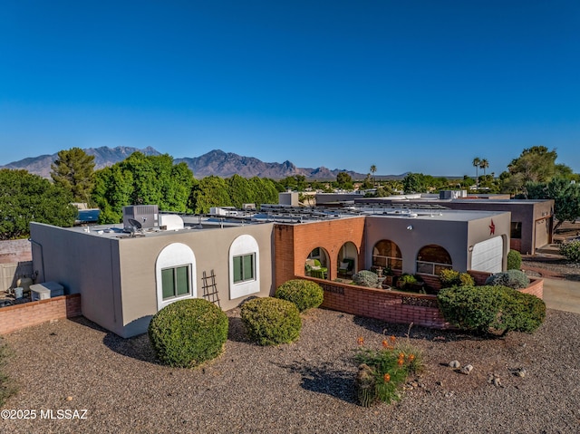 1939 S San Vincent Dr, Green Valley, AZ 85614 - view of front of property with a mountain view and stucco siding