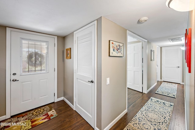 1939 S San Vincent Dr, Green Valley, AZ 85614 - entryway with dark wood finished floors and baseboards