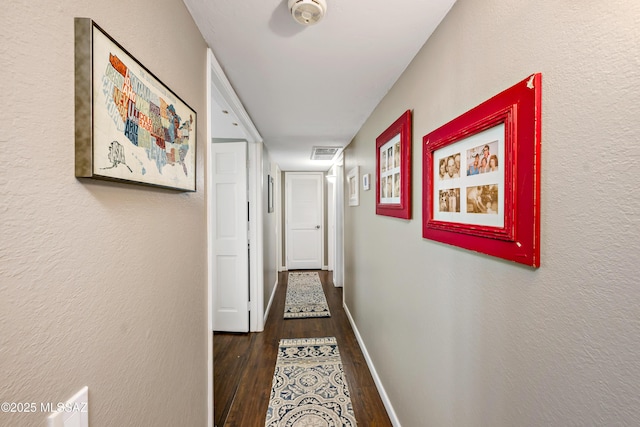 1939 S San Vincent Dr, Green Valley, AZ 85614 - corridor with wood finished floors and a textured wall