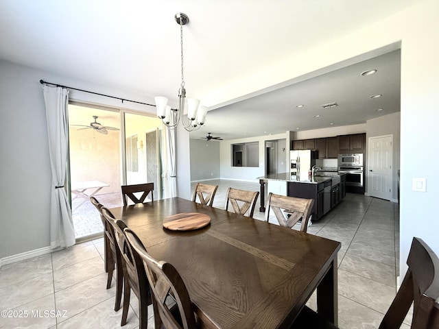 9636 N Havenwood Way, Marana, AZ 85653 - dining room with a ceiling fan, a chandelier, light tile patterned floors, and recessed lighting