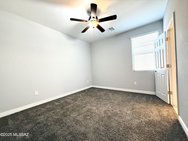 9636 N Havenwood Way, Marana, AZ 85653 - unfurnished room with a ceiling fan and dark colored carpet