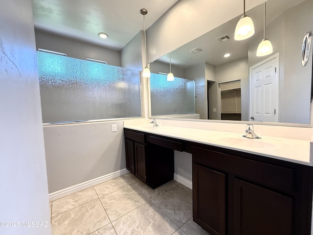 9636 N Havenwood Way, Marana, AZ 85653 - bathroom with double vanity, tile patterned flooring, and a closet