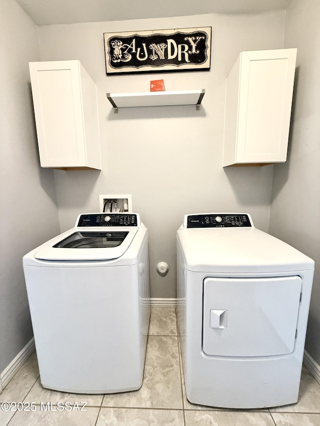 9636 N Havenwood Way, Marana, AZ 85653 - laundry area with cabinet space, separate washer and dryer, and light tile patterned flooring