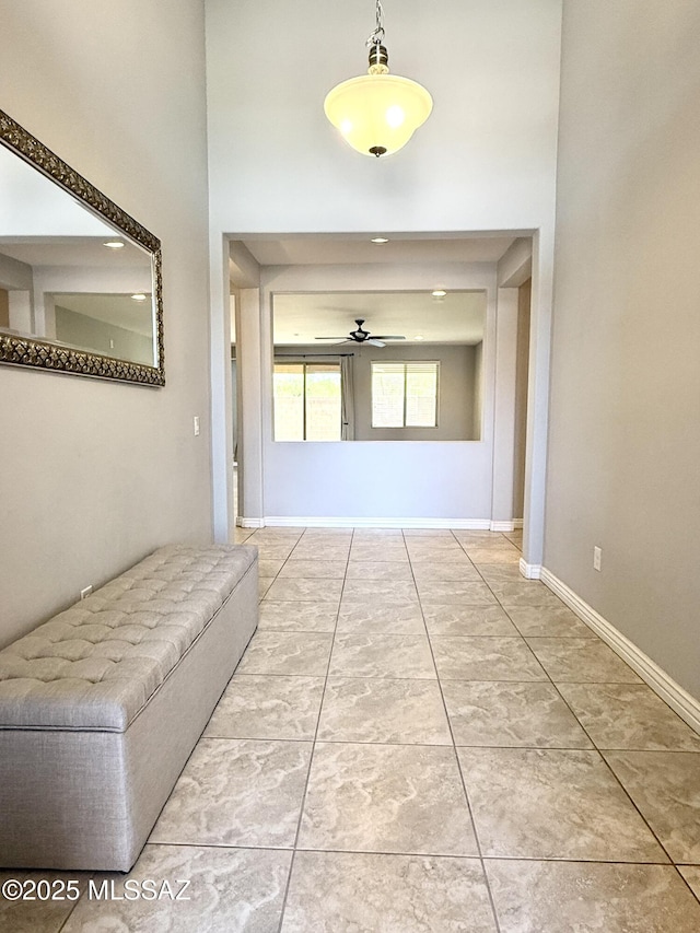 9636 N Havenwood Way, Marana, AZ 85653 - hallway with baseboards and tile patterned floors