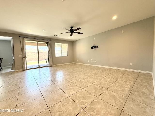 9636 N Havenwood Way, Marana, AZ 85653 - spare room featuring light tile patterned flooring, a ceiling fan, and recessed lighting