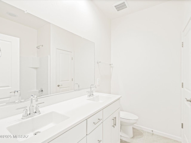 306 N Spring Flower Dr, Tucson, AZ 85748 - full bathroom featuring double vanity, tile patterned floors, and a shower