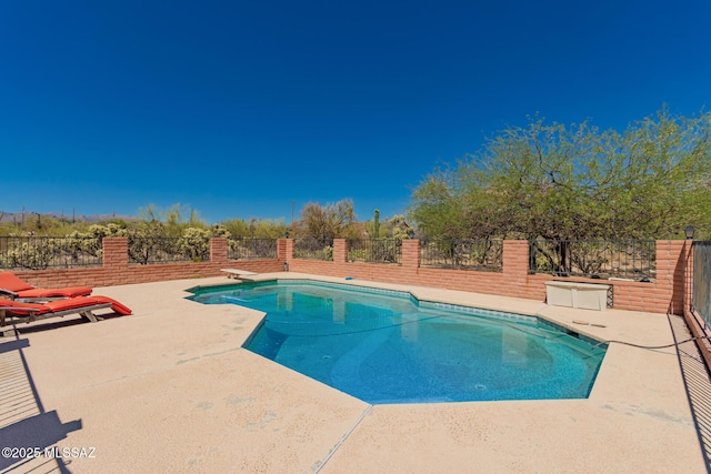 10901 N Camino De Oeste, Tucson, AZ 85742 - view of swimming pool with a patio area and a diving board