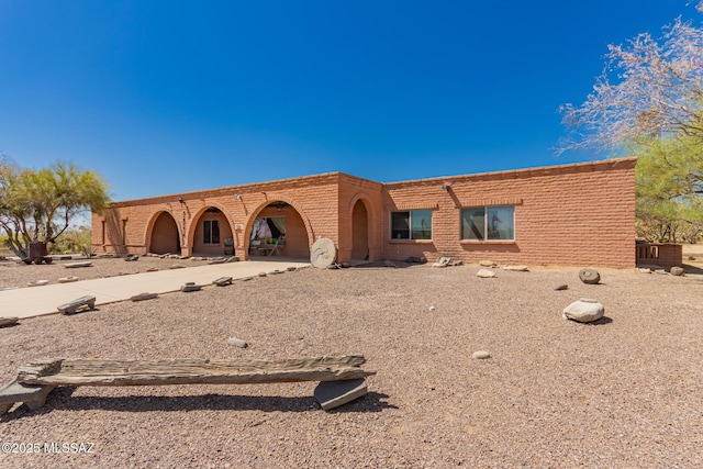 10901 N Camino De Oeste, Tucson, AZ 85742 - rear view of house with brick siding