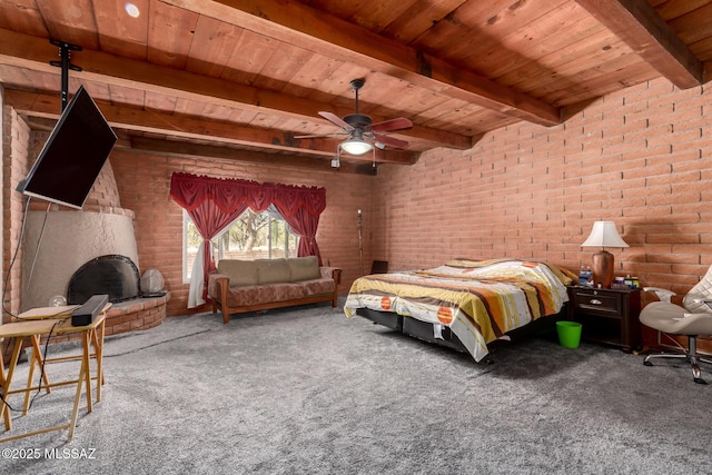 10901 N Camino De Oeste, Tucson, AZ 85742 - bedroom featuring a wood ceiling with exposed beams, brick wall, and carpet