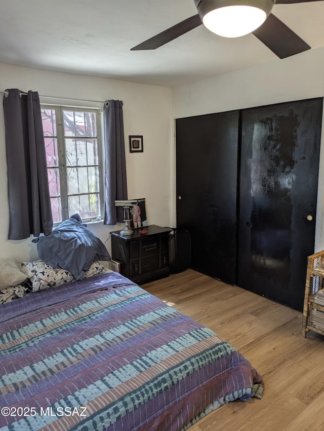 1036 S 4th Ave, Tucson, AZ 85701 - bedroom with wood finished floors and a ceiling fan