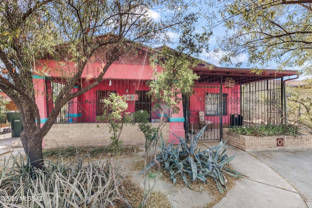 1036 S 4th Ave, Tucson, AZ 85701 - view of front of property featuring a gate