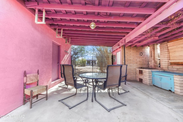 1036 S 4th Ave, Tucson, AZ 85701 - view of patio / terrace with outdoor dining area and an outdoor kitchen