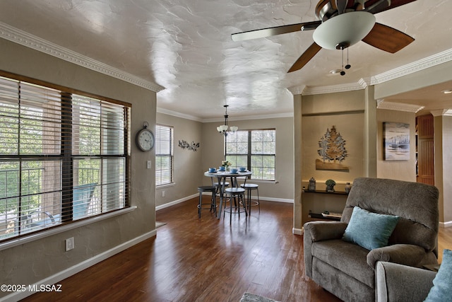 6651 N Campbell Ave Unit 286, Tucson, AZ 85718 - dining room featuring dark wood finished floors, a chandelier, ceiling fan, and ornamental molding