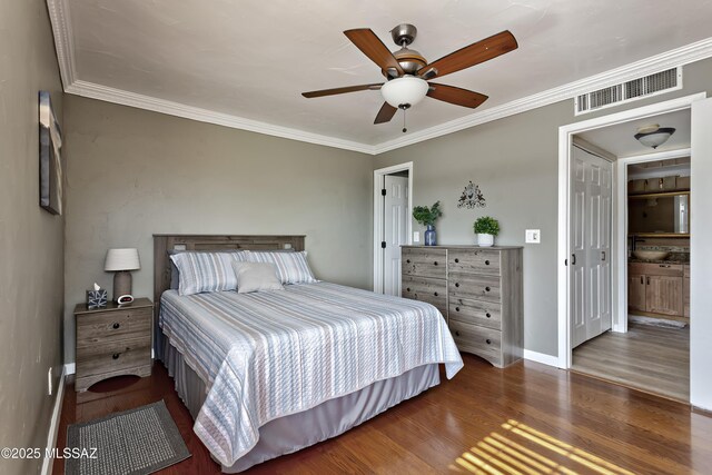6651 N Campbell Ave Unit 286, Tucson, AZ 85718 - bedroom featuring wood finished floors, crown molding, and a ceiling fan