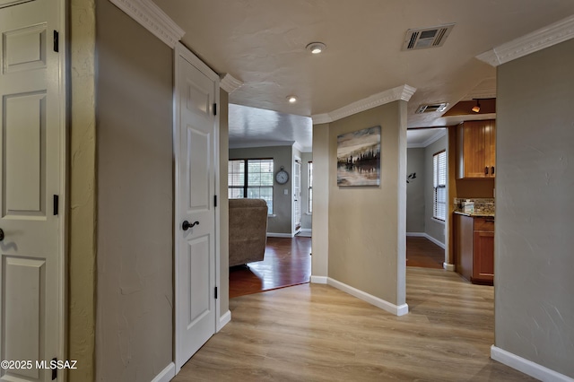 6651 N Campbell Ave Unit 286, Tucson, AZ 85718 - hall featuring crown molding, plenty of natural light, and light wood-style floors