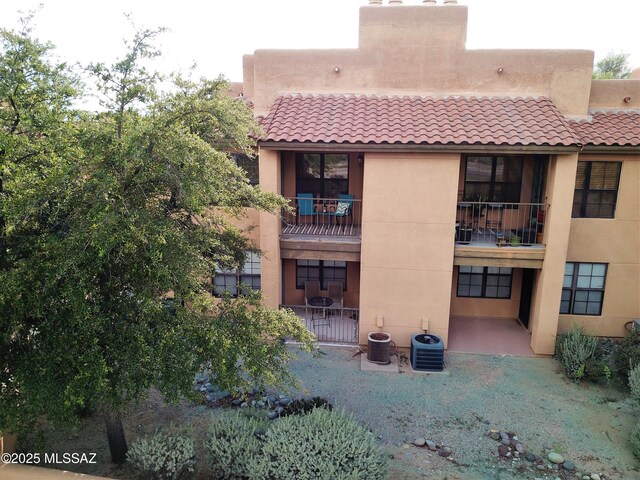 6651 N Campbell Ave Unit 286, Tucson, AZ 85718 - rear view of property with a balcony and stucco siding