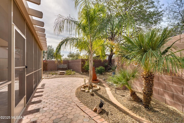 9223 N Crimson Stone Pl, Tucson, AZ 85743 - fenced backyard with a patio area