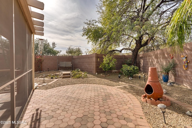 9223 N Crimson Stone Pl, Tucson, AZ 85743 - fenced backyard featuring a patio