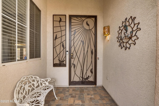 9223 N Crimson Stone Pl, Tucson, AZ 85743 - property entrance featuring stucco siding