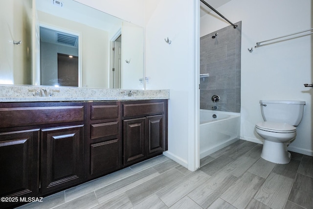 6860 E Via Arroyo Largo, Tucson, AZ 85756 - full bathroom with double vanity, bathtub / shower combination, and wood finish floors