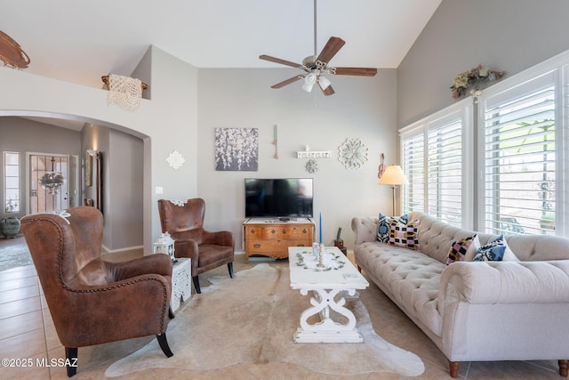 9908 E Shadow Glen Ct, Tucson, AZ 85748 - living area featuring arched walkways, ceiling fan, and high vaulted ceiling
