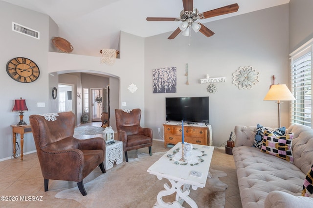 9908 E Shadow Glen Ct, Tucson, AZ 85748 - living area with arched walkways, a ceiling fan, and high vaulted ceiling