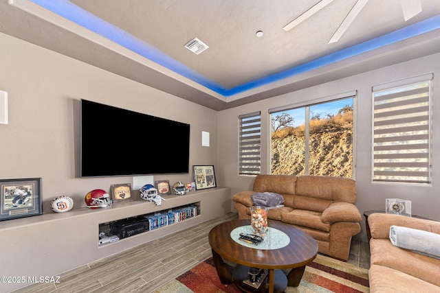 3188 W Tumamoc Dr, Tucson, AZ 85745 - living area featuring wood tiled floors and a raised ceiling