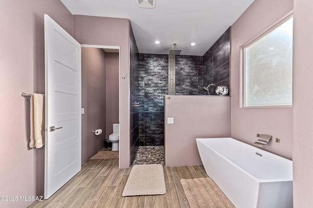 3188 W Tumamoc Dr, Tucson, AZ 85745 - bathroom featuring a walk in shower, a soaking tub, wood finished floors, and recessed lighting